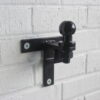 Crookstopper wall mounted hitch lock security post used for bike carrier storage.
